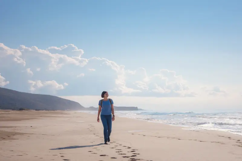 backpacker asian female on patara sand dunes beach
