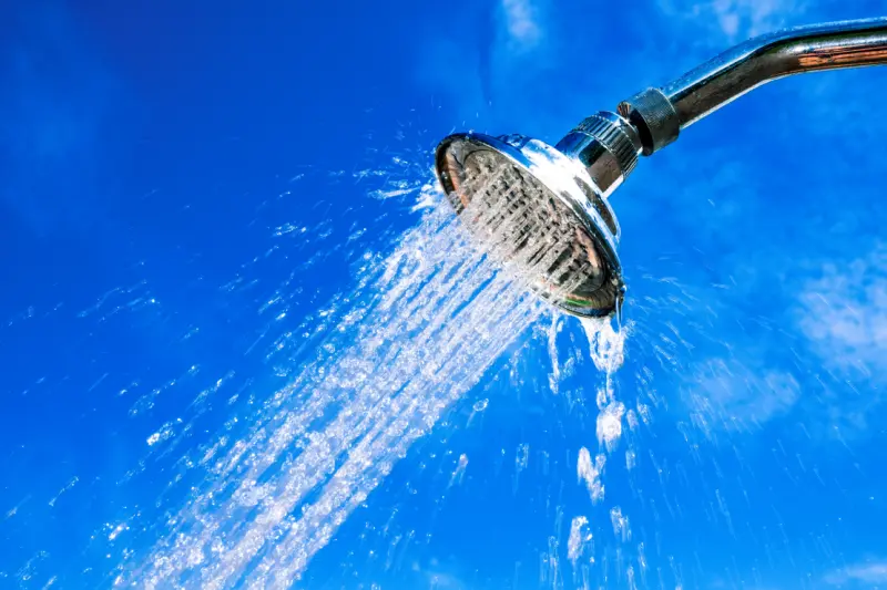 Outdoor shower head with water flow