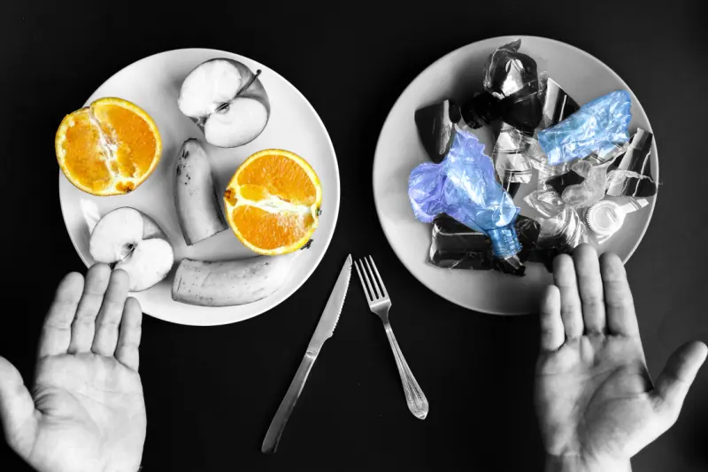 Plastic bottles and fruit on a plate